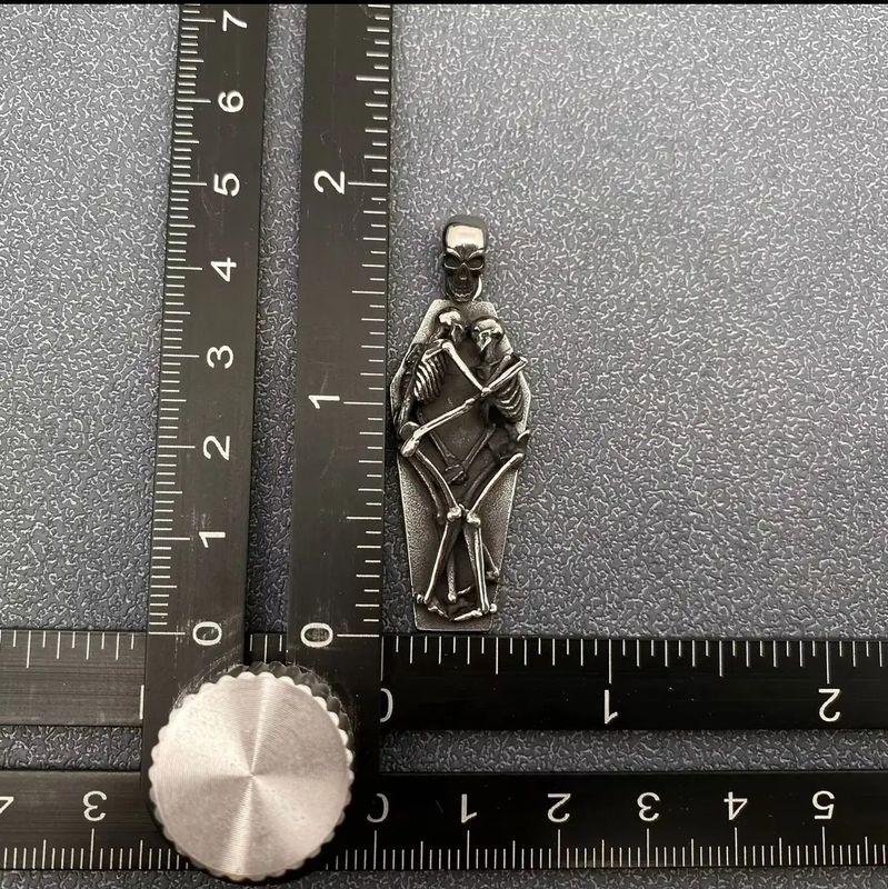 Couples Embrace Pendant + Chain