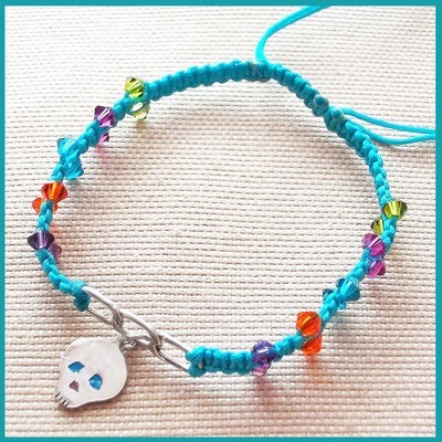 Pulsera #TodosSomosCalacas azul, plata
