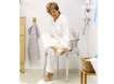 Chaise de douche Etac avec accoudoirs et dossier