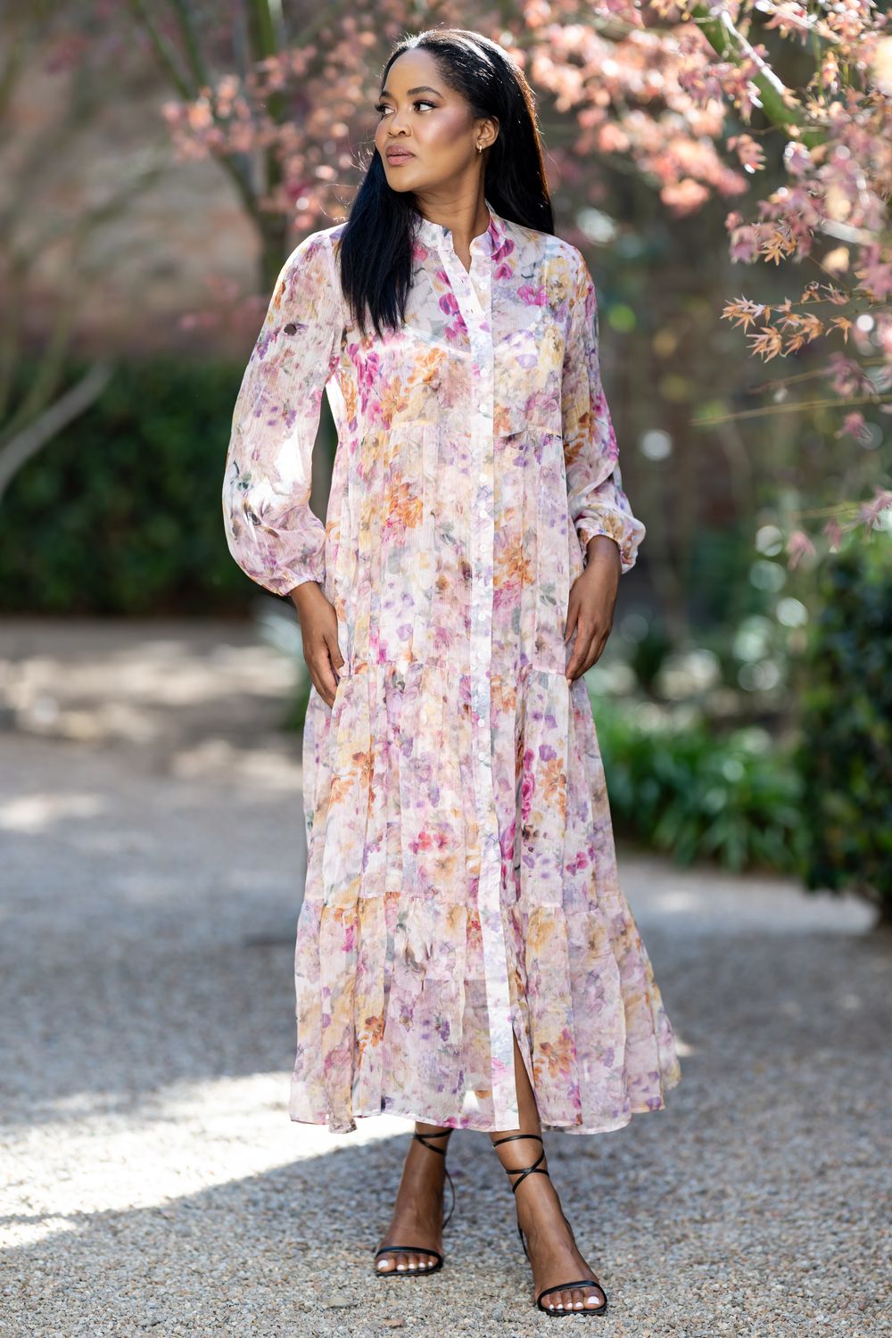 Mastik button down tiered dress with a matching print underdress