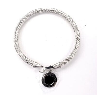 Silver bangle with black dial disc