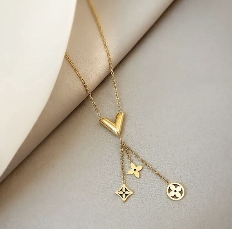 Gold V necklace with drop flowers