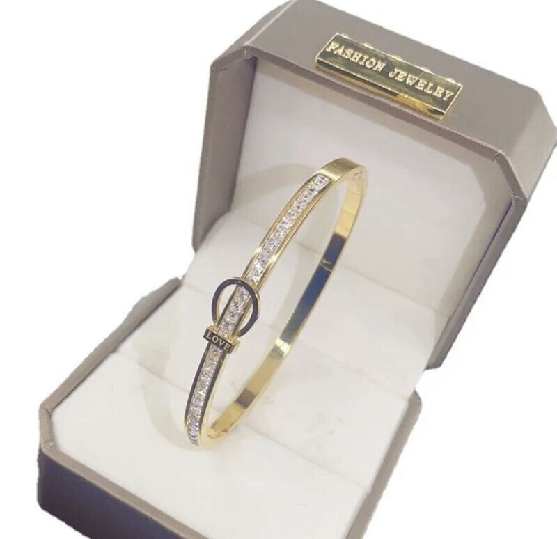 Gold love bangle