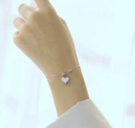 Silver bracelet with drop heart