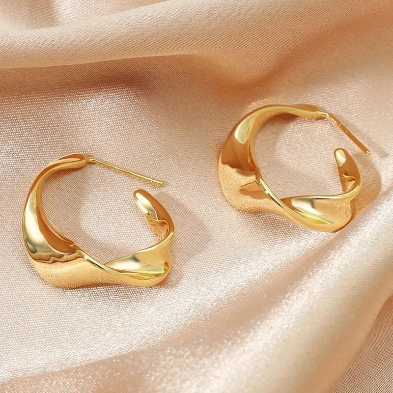 Chic twisted gold hoops