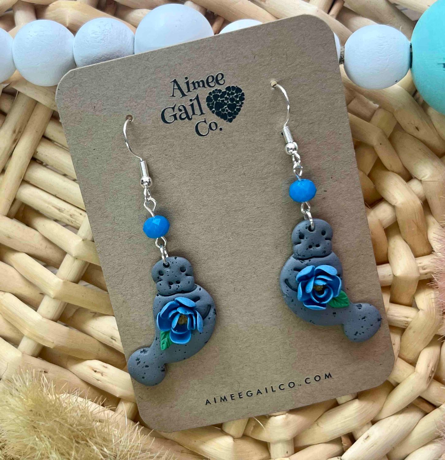 Manatee with Rose Dangle