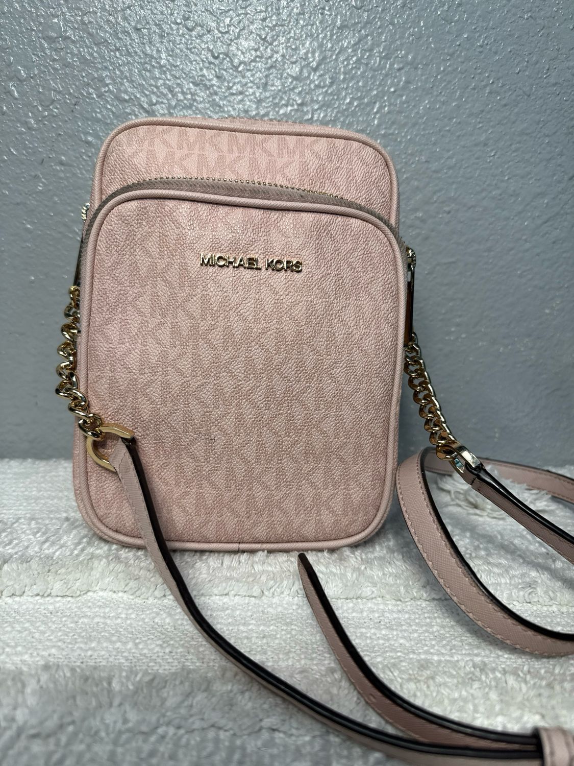 Michael Kors’s Baby Pink Signature Coated Canvas Multi Pocket Crossbody