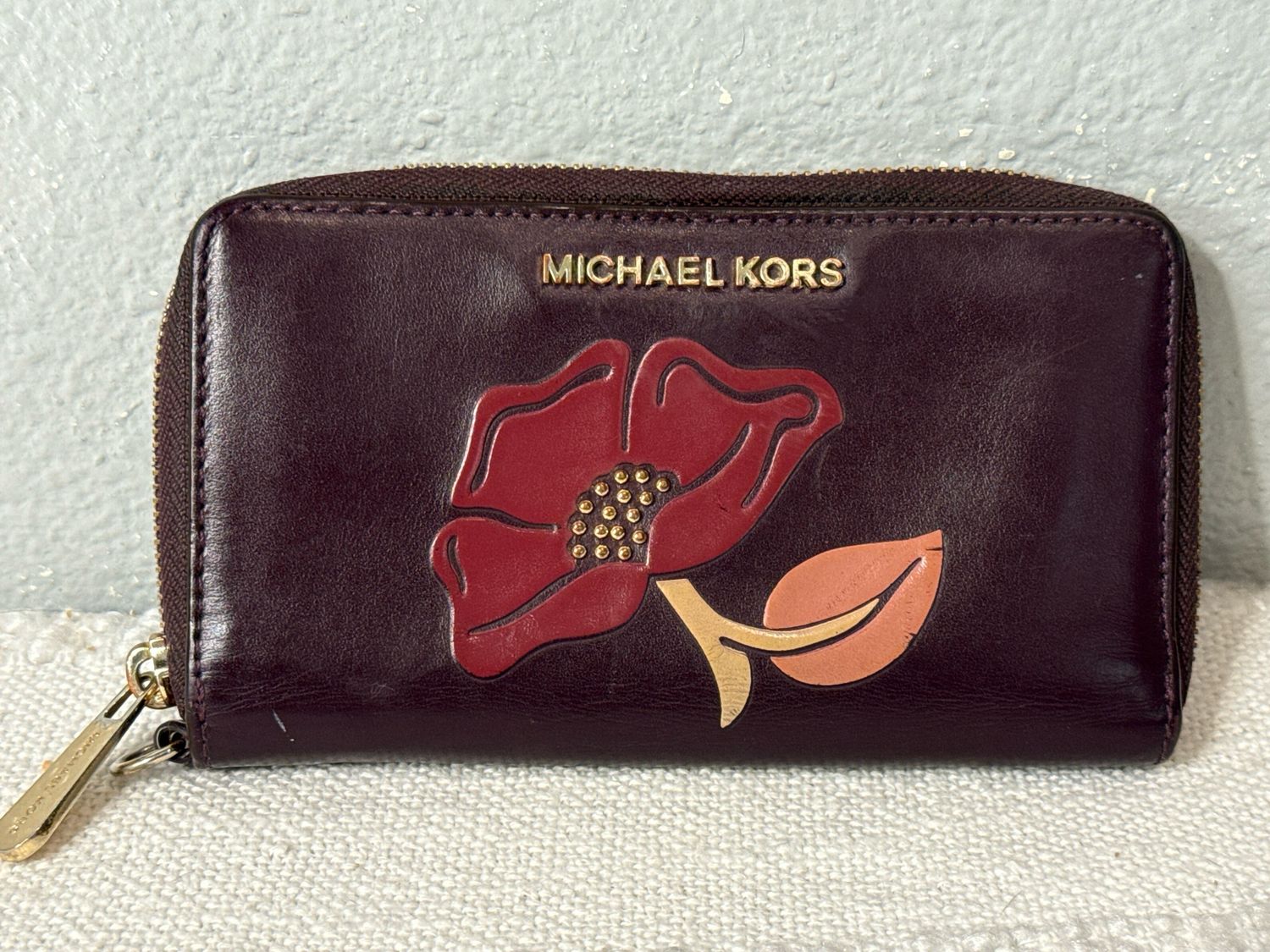 Michael Kors RARE Plum Embossed Floral Leather Wallet