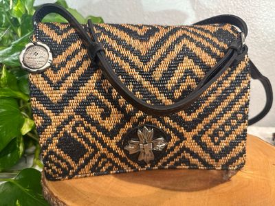 Patricia Nash black leather and strawlike material 10th anniversary Crossbody new without tags