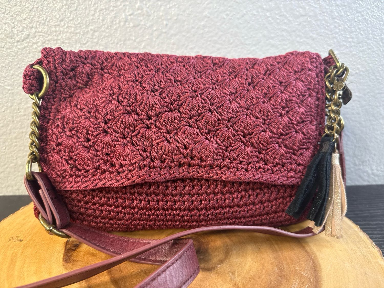 The SAK Burgundy, Crochet Crossbody With Leather Tassel, Charm And Leather Crossbody Strap