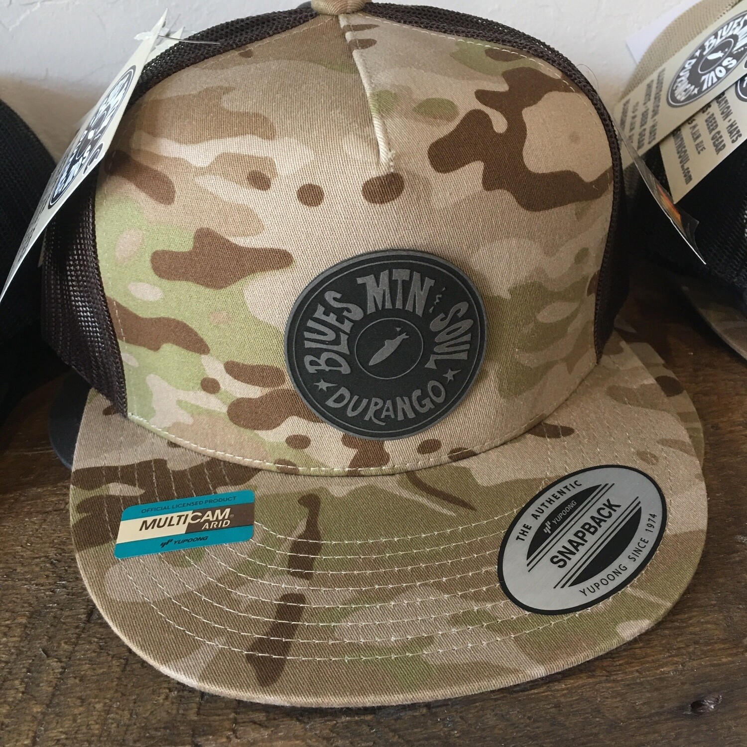 BLUES MTN &amp; SOUL LOGO | LEATHER PATCH | 5-PANEL CLASSIC TRUCKER HAT, PATCH: LEATHER, COLOR: MULTI CAMO