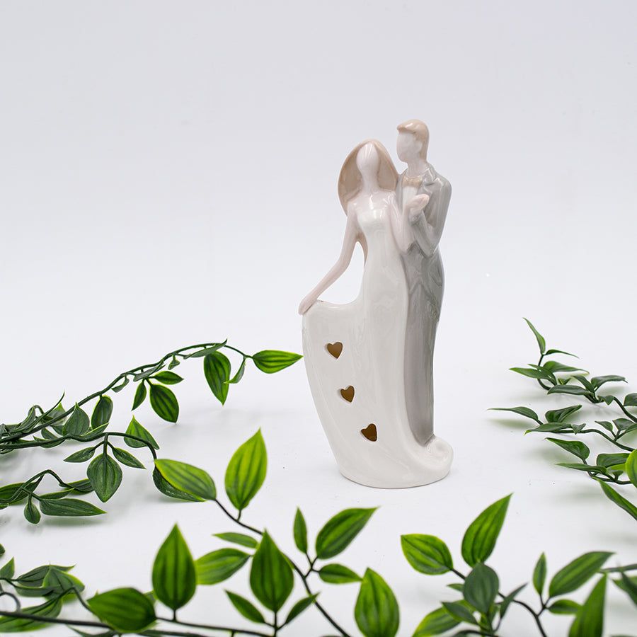 Sculpture de couple en céramique avec lumière LED