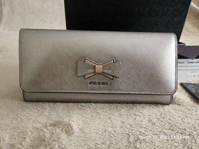 PRADA Bow Continental Wallet in Silver Saffiano Leather