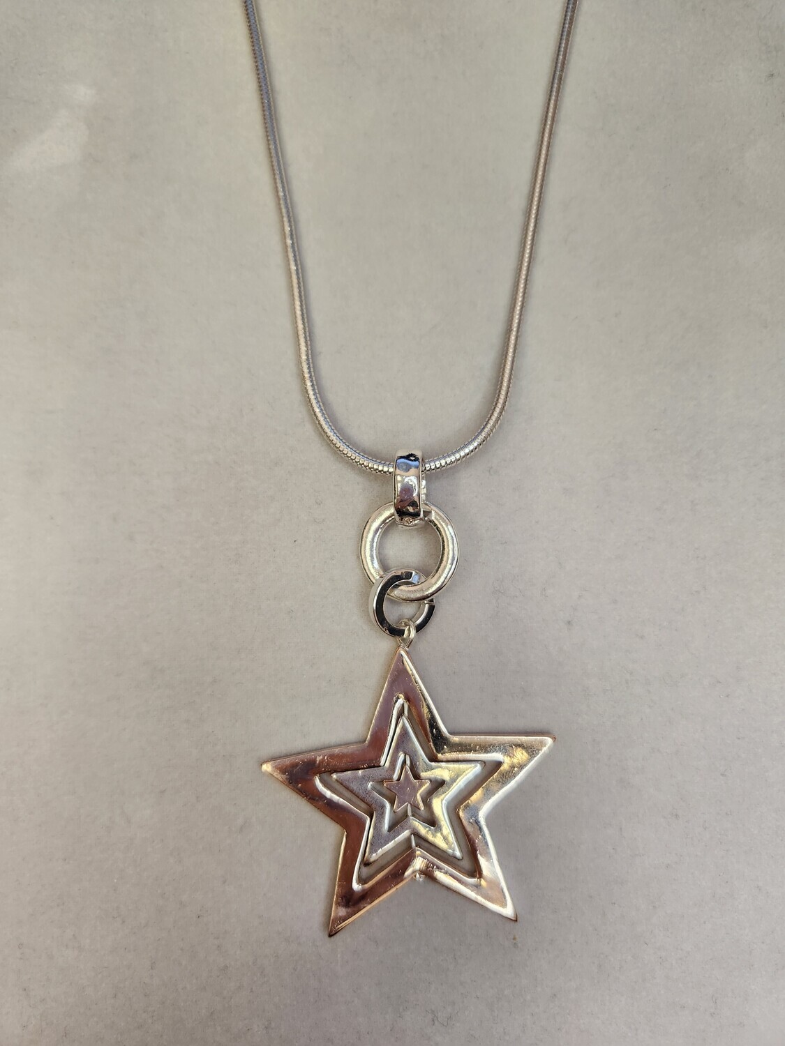Long Silver Necklace  with rotating stars   silver/rose gold