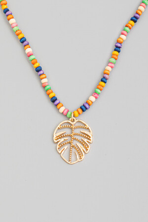 B7N3269   Beaded Monstera Leaf Cutout Pendant Necklace