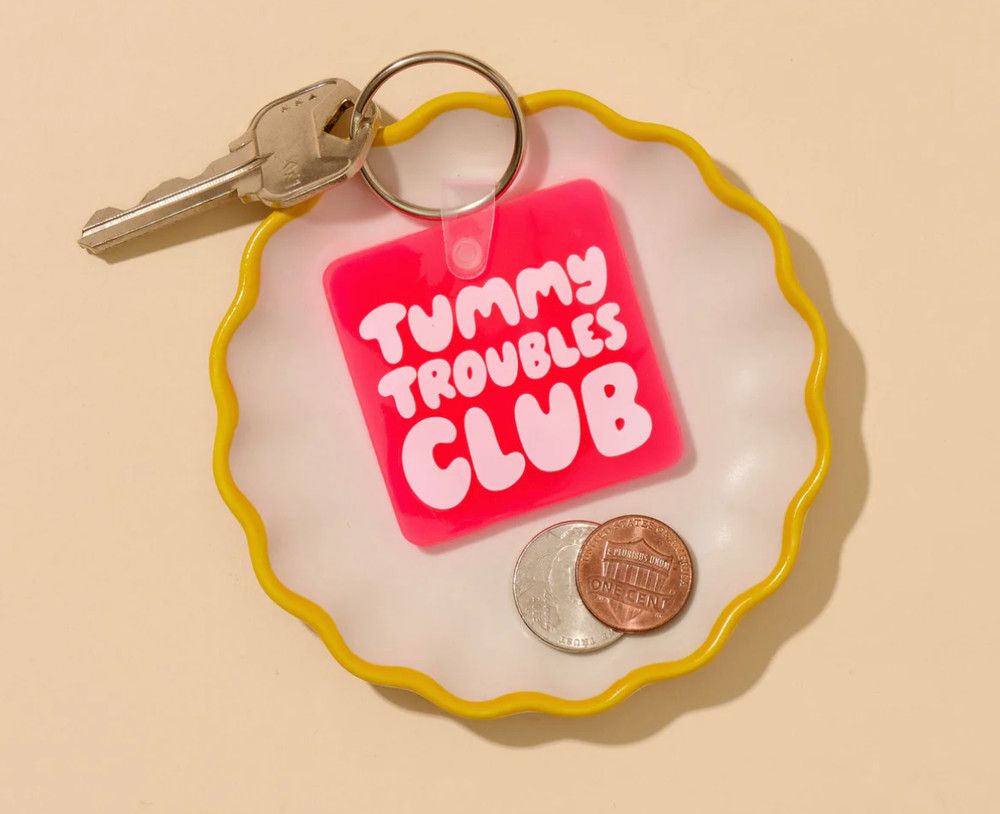 AND HERE WE ARE KEYCHAIN- TUMMY TROUBLES
