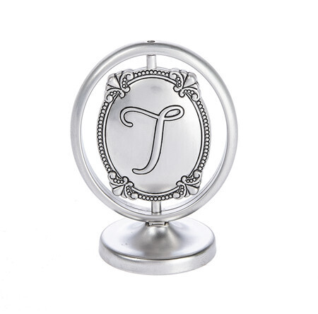 SPINNING MINI FIGURINE-T