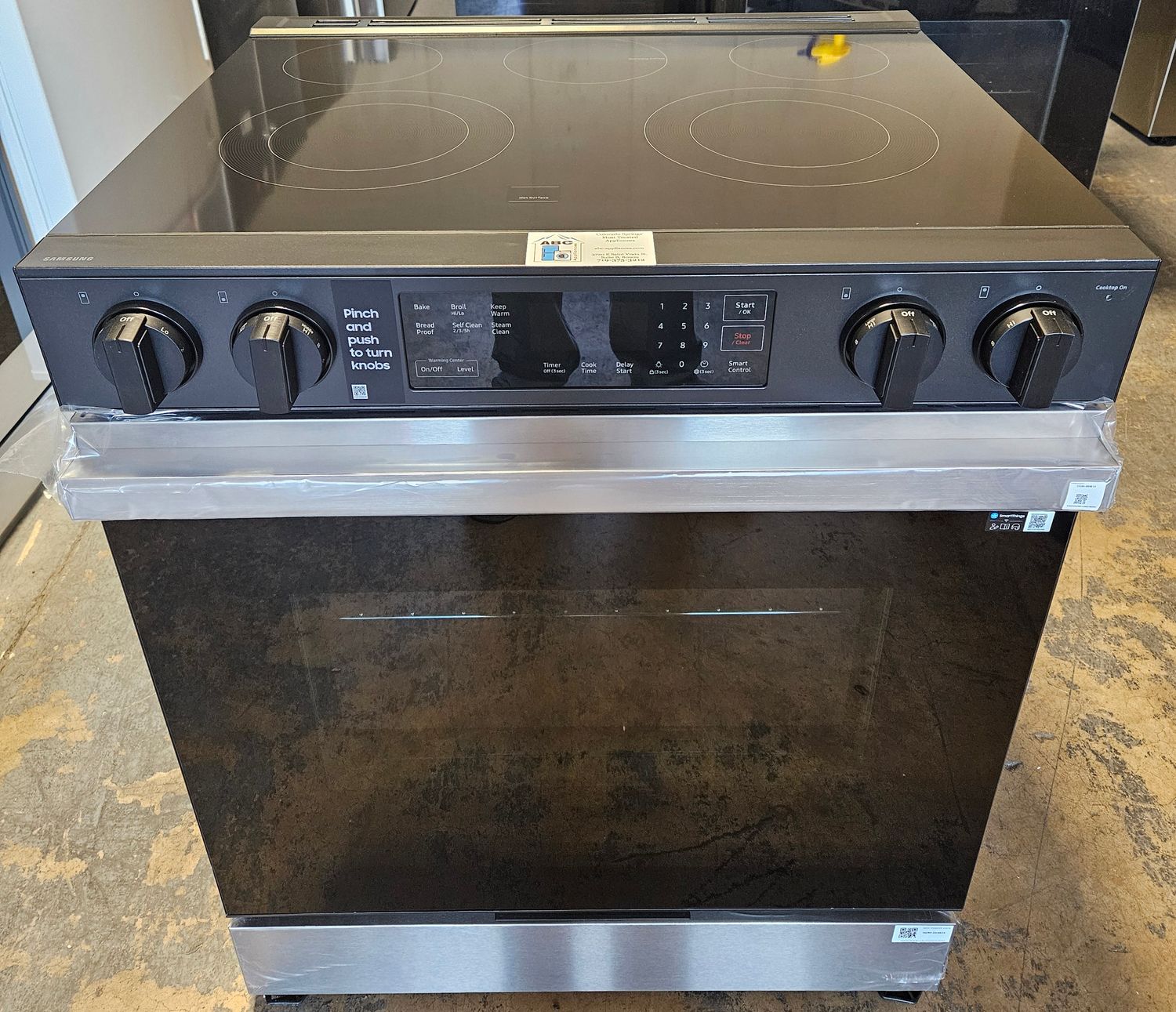 NEW! 30in Samsung Bespoke 6.3 cu. ft. Smart Slide-In Electric Range with Precision Knobs in Stainless Steel