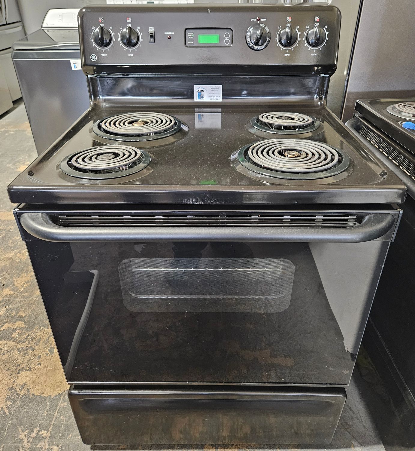 USED 30in GE Black Coil-top 4-burner Range 90 Day Warranty