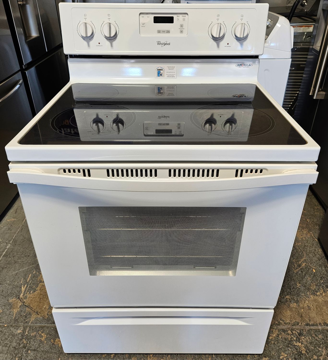 USED 30in Whirlpool Electric Glass-top 4-Burner Range in White USED 30in Whirlpool Electric Glass-top 4-Burner Range in White