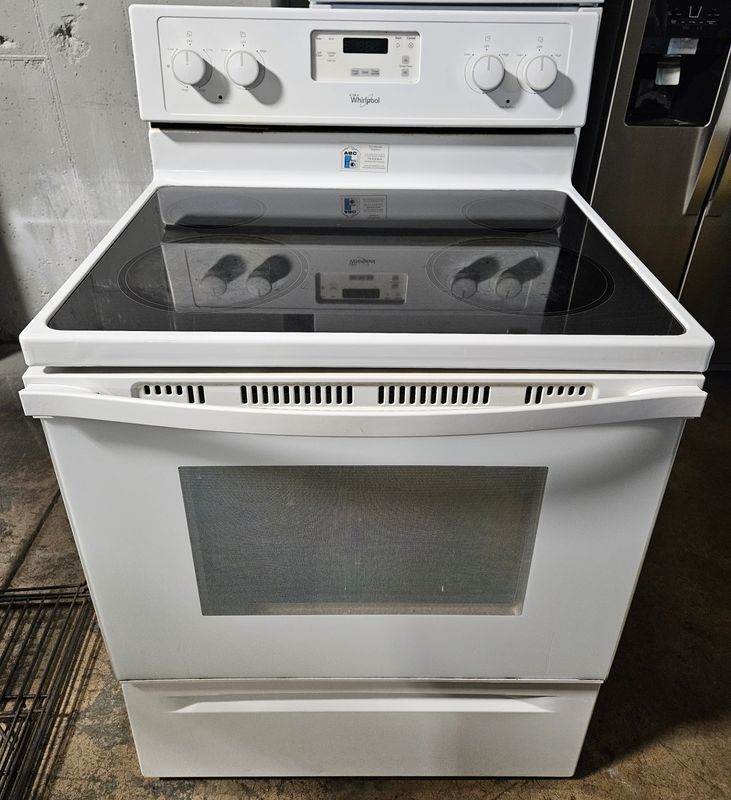USED 30in Whirlpool 4-Burner Glass-top Electric Range in White USED 30in Whirlpool 4-Burner Glass-top Electric Range in White