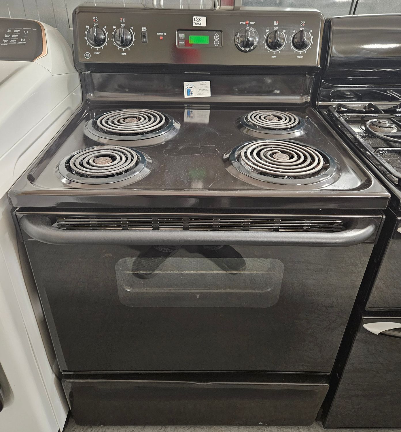 USED 30in GE Black Electric Coil-top 4-Burner Range