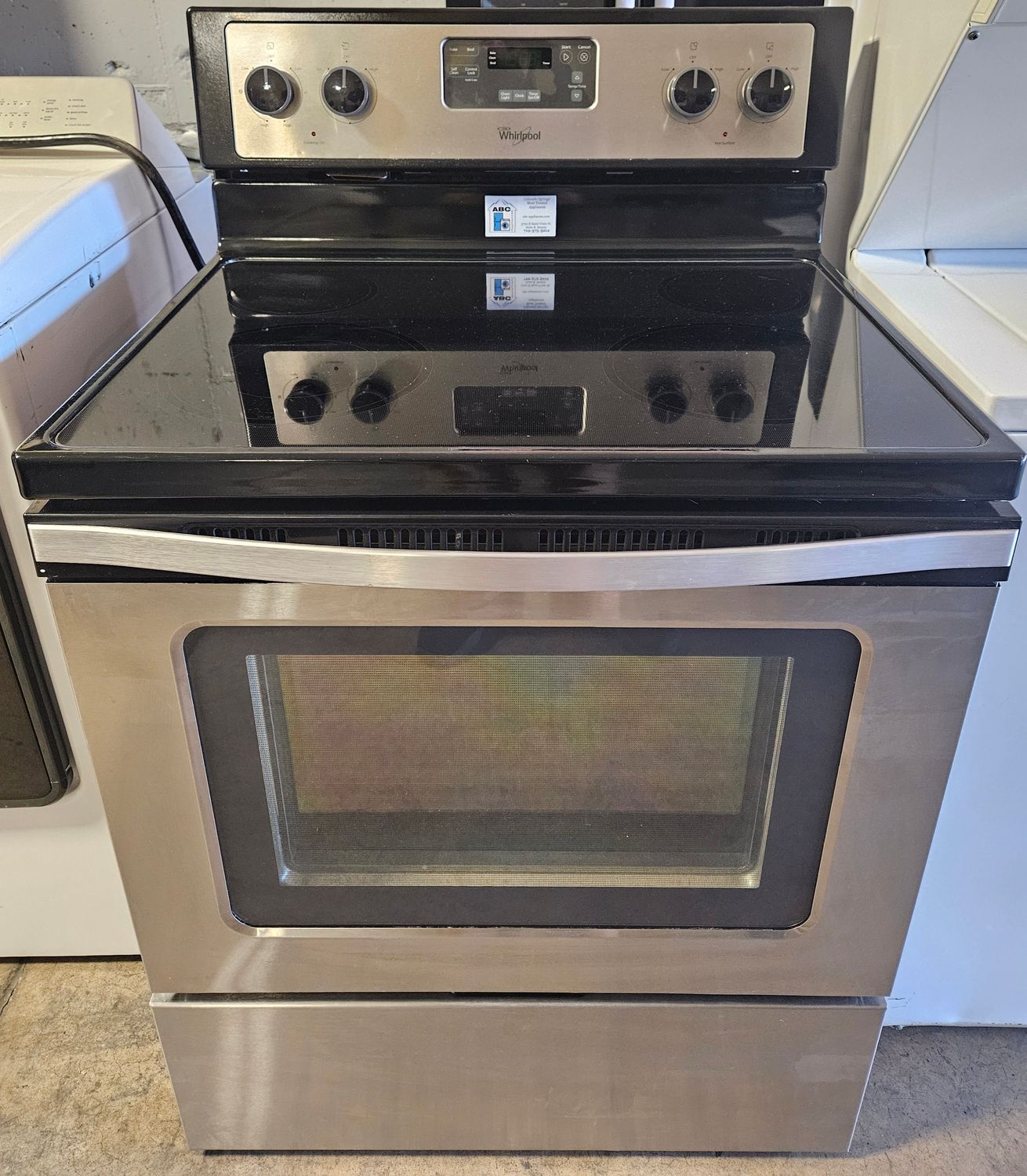 USED 30in Whirlpool Electric Glass-Top 4-Burner Range in Stainless Steel