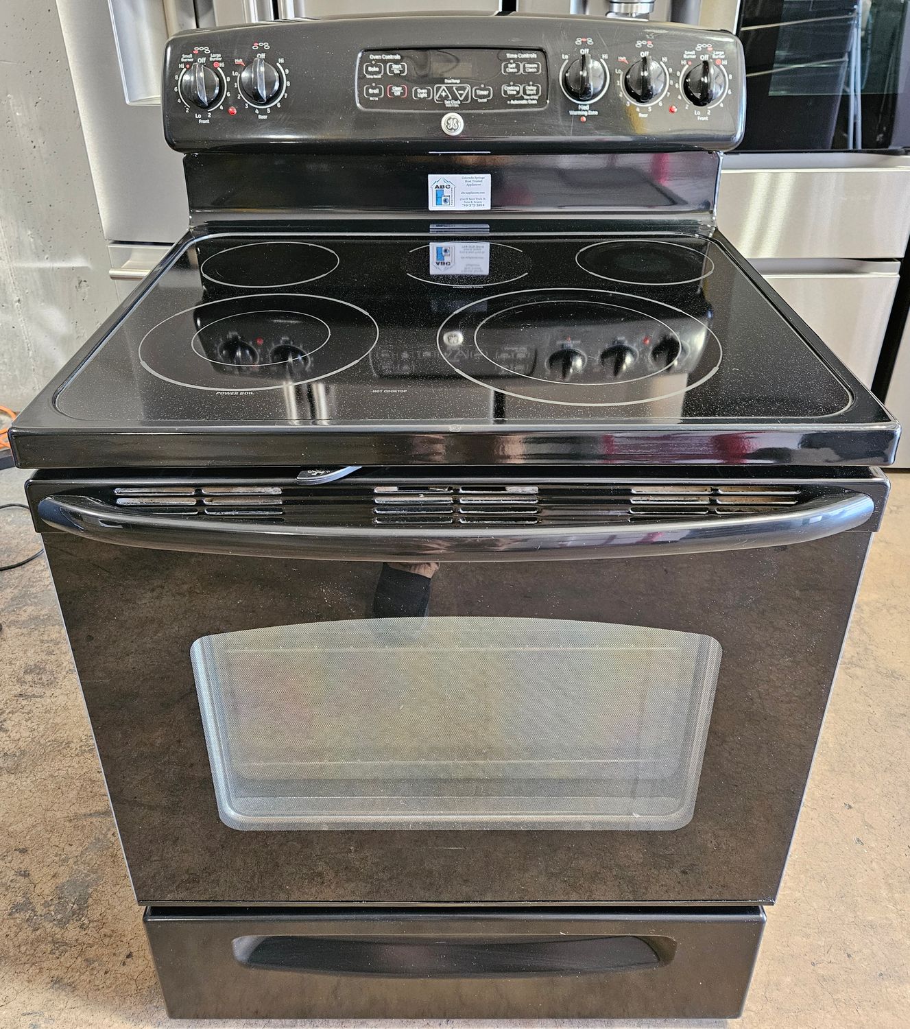USED 30in GE 5-Burner Glass-Top Electric Range in Black