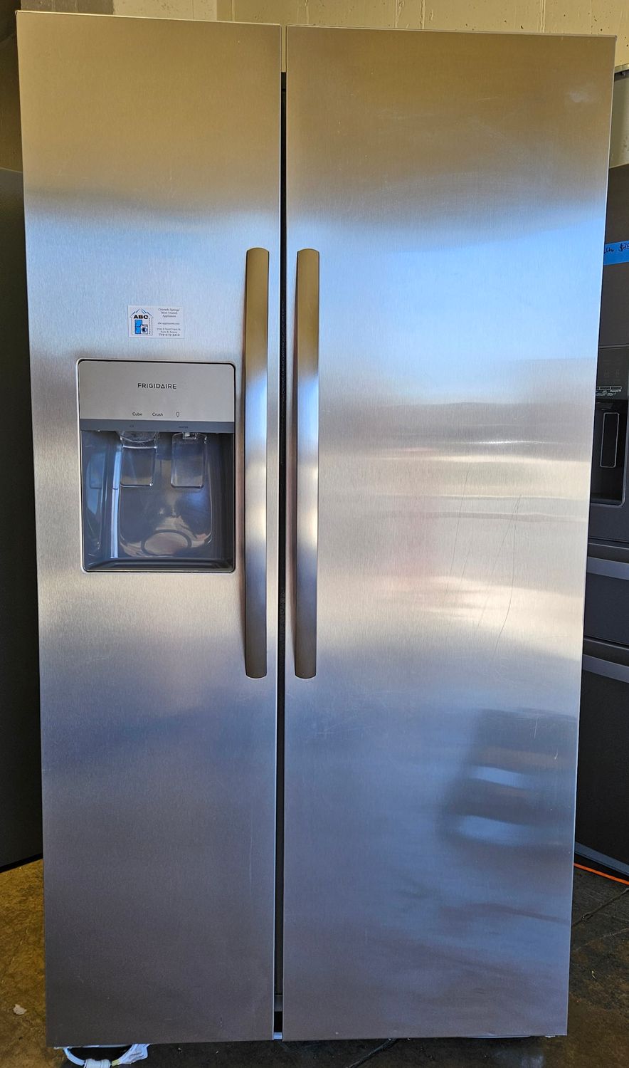 USED 26cu.ft. Frigidaire Side-by-Side Refrigerator in Stainless Steel