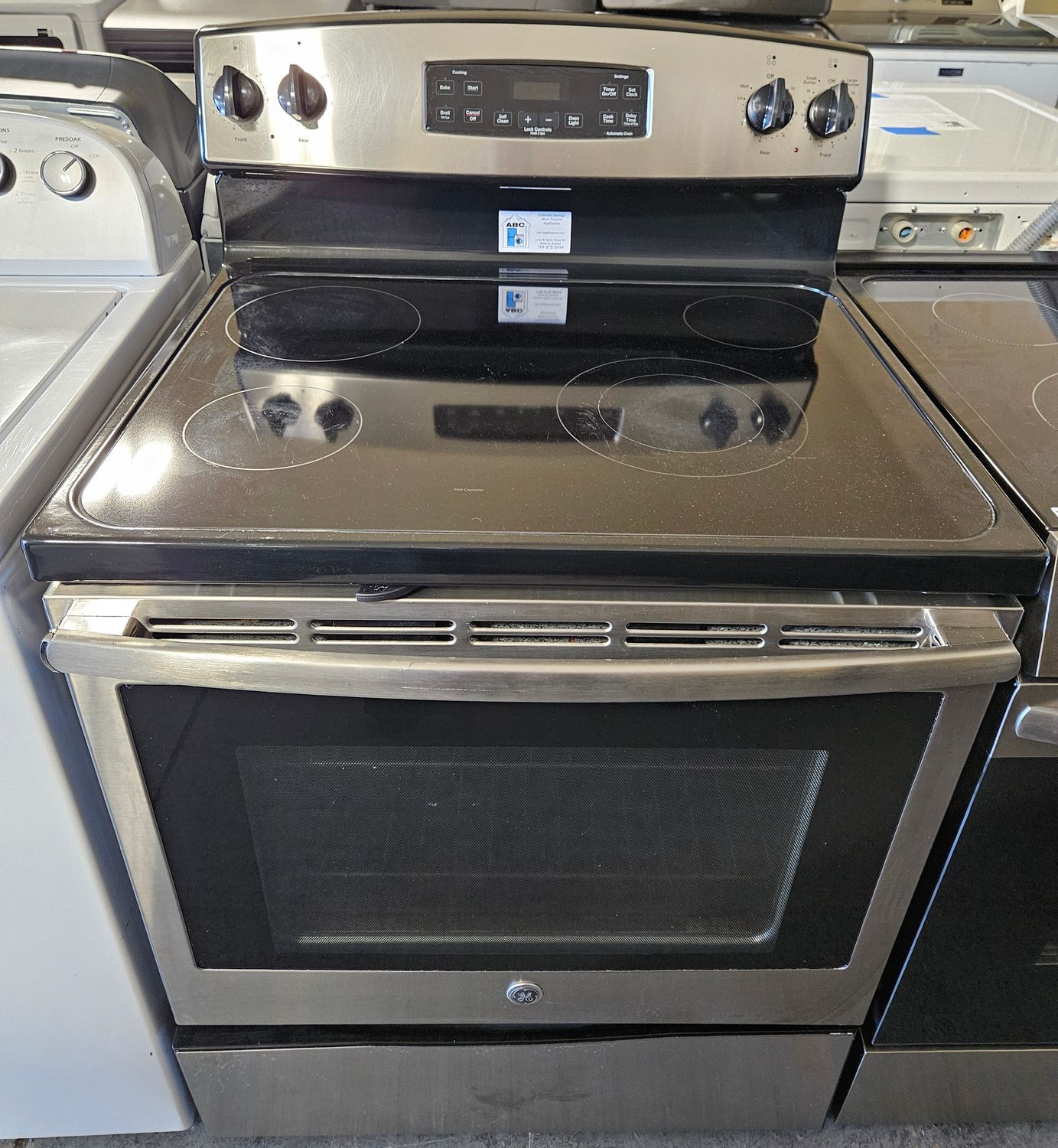 USED 30in GE Electric 4-Burner Glass-Top Range in Stainless Steel