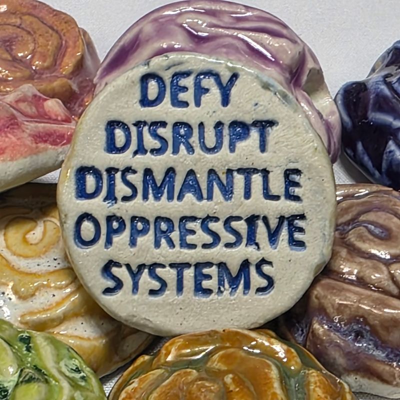 Defy Disrupt Dismantle Oppressive Systems