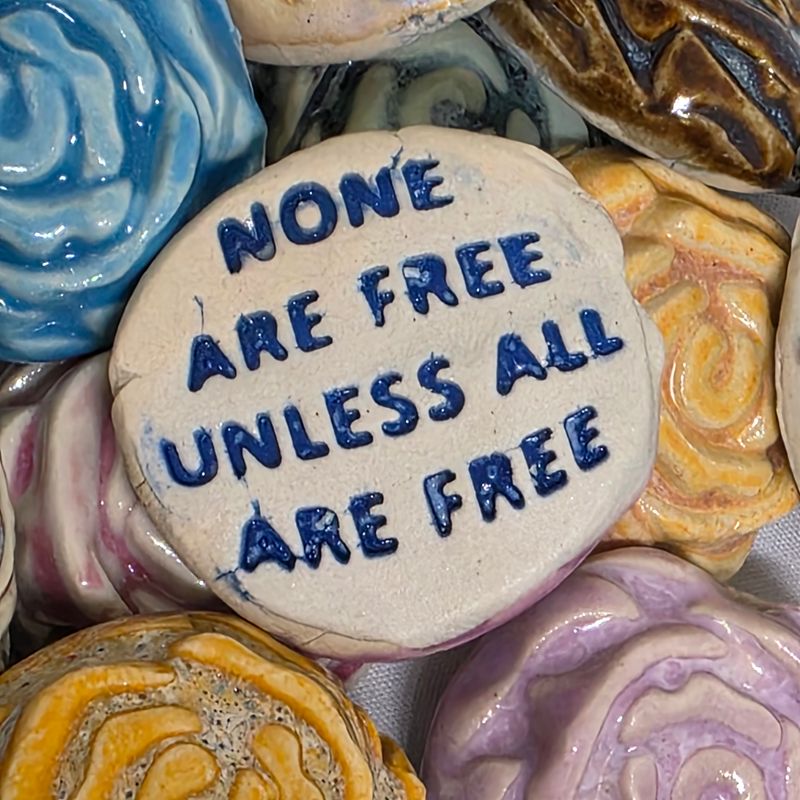 None Are Free Unless All Are Free