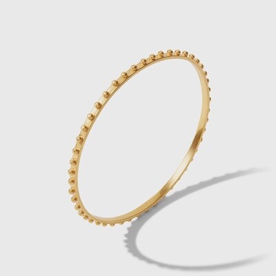 Julie Vos SoHo Studded Stacking Bangle in gold and mixed metal with decorative studs, photographed against a neutral studio background