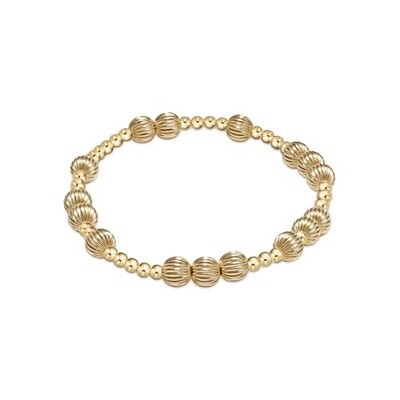ENEWTON Hope Unwritten Dignity bracelet with 6mm gold beads on a white background