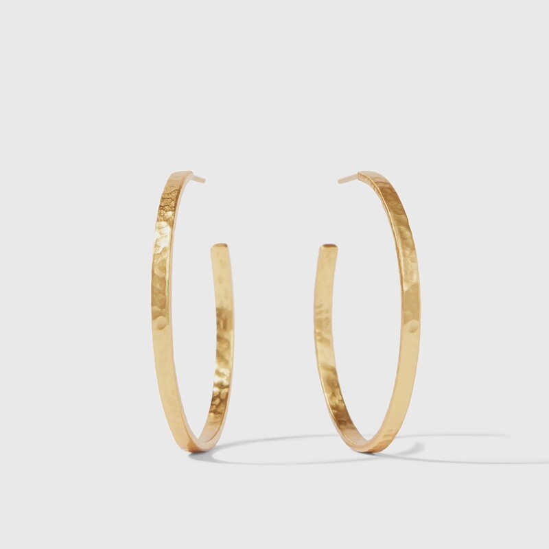 Julie Vos Crescent Hoop Earrings in 24K gold plate with hammered texture, displayed in a lifestyle setting