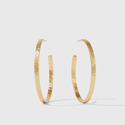 Julie Vos Crescent Hoop Earrings in 24K gold plate with hammered texture, displayed in a lifestyle setting