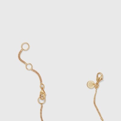 Julie Vos 24k gold-plate delicate bracelet and necklace extender chain displayed in a lifestyle setting