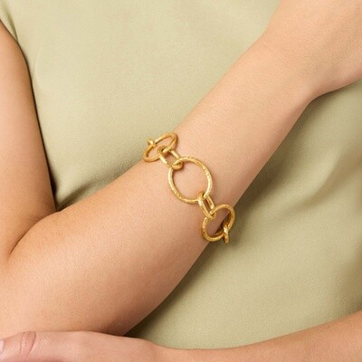 Julie Vos Catalina light link bracelet in 24K gold plate with toggle clasp, worn on wrist in natural light