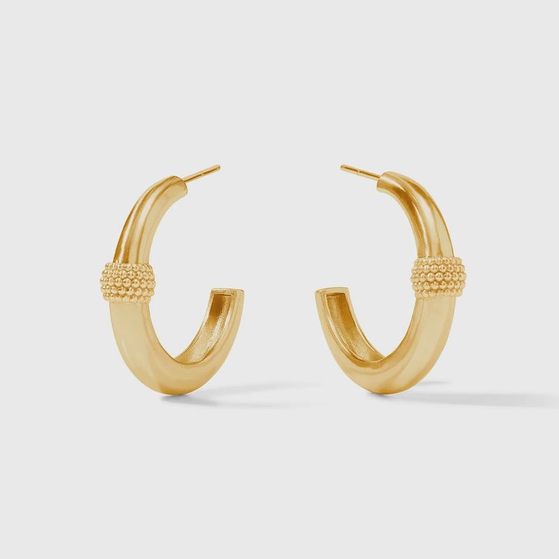 Julie Vos beaded station hoop earrings with cabochon stone in 24K gold plate, worn in lifestyle setting