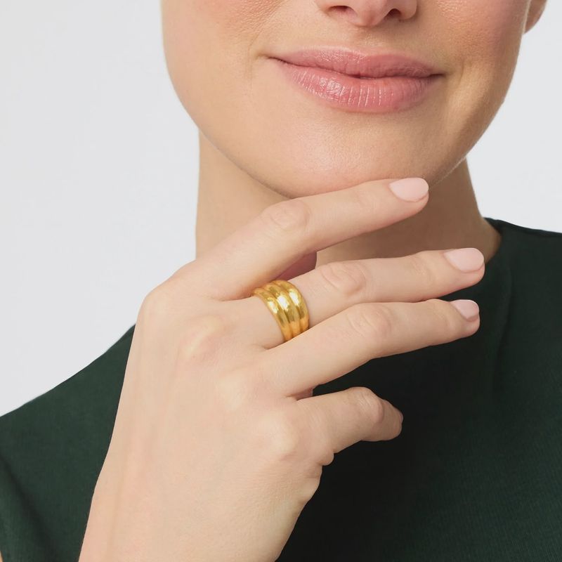 Julie Vos Cirque Ring in 24K gold plate worn on a hand in a lifestyle setting