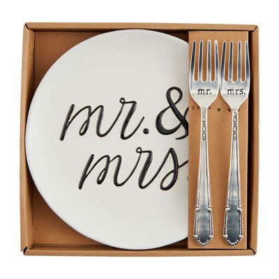 Two ceramic cake plates with Mr. and Mrs. text, displayed on white background in studio setting