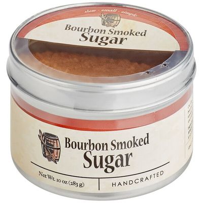 Bourbon Barrel Foods Bourbon Smoked Demerara Sugar in a clear glass jar against a white background