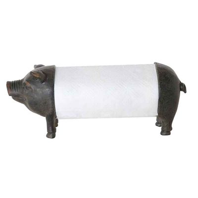 Cream-colored pig-shaped ceramic paper towel holder in farmhouse style, shown against a white background