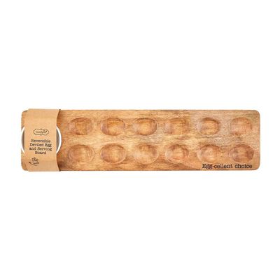 Reversible mango wood serving board with attached ceramic dip bowl, displayed in studio on neutral background