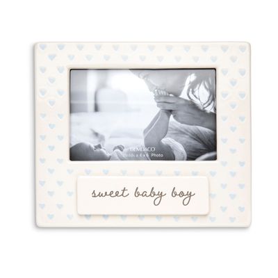 Sweet Baby personalized nursery frame for boys in studio lighting against a neutral background, showing customizable text area and decorative design