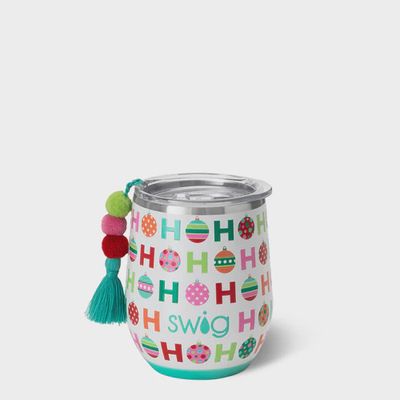 Red Swig Life HoHoHo stemless wine cup with white text and tassel charm, shown against a white studio background