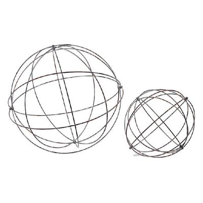 Set of polished metal spheres in varying sizes arranged on a neutral background