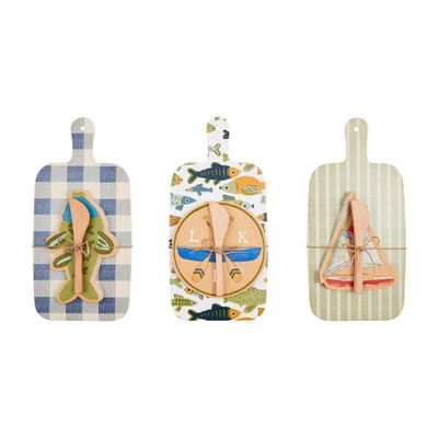 Mud Pie Lake outdoor melamine paddle board and napkin three-piece set displayed on white background in studio setting