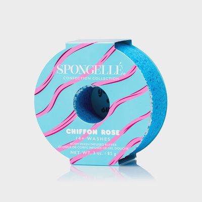 Spongellé Confection Buffer exfoliating sponge in chiffon rose, shaped like a donut with textured surface for gentle exfoliation