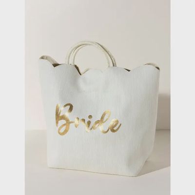 Ivory Shiraleah Bride tote bag with scalloped edge detail and magnetic snap closure, displayed against a neutral background
